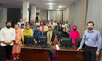 Graduates and trainees gathering inside the TechHub lab